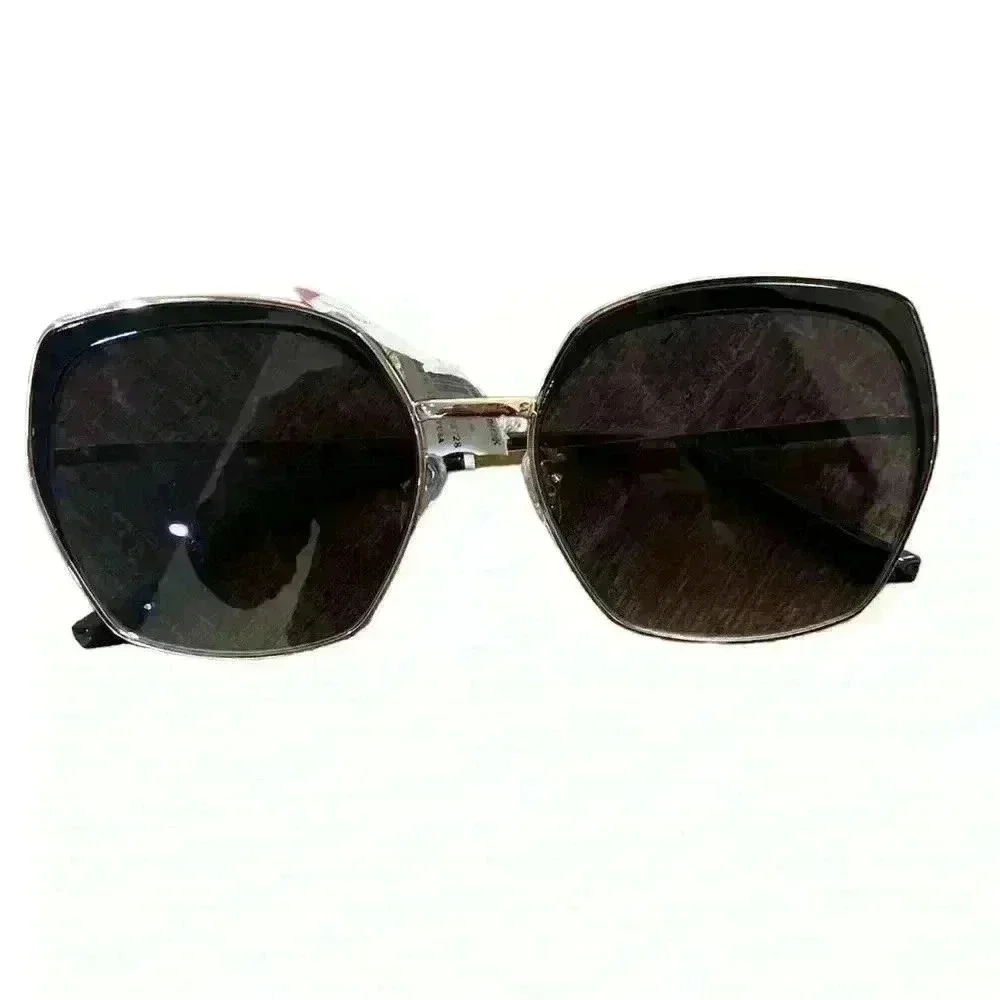Guess sunglasses women’s abstract shaped. NWT